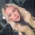 Playful and sexy blonde Khloe, slim with big breasts and full lips, from Soho