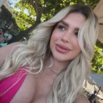 Sexy blonde Khloe with big breasts and full lips, from Soho