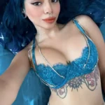 VIP Escort Kari a young blue-haired beautiful woman from Ilford London